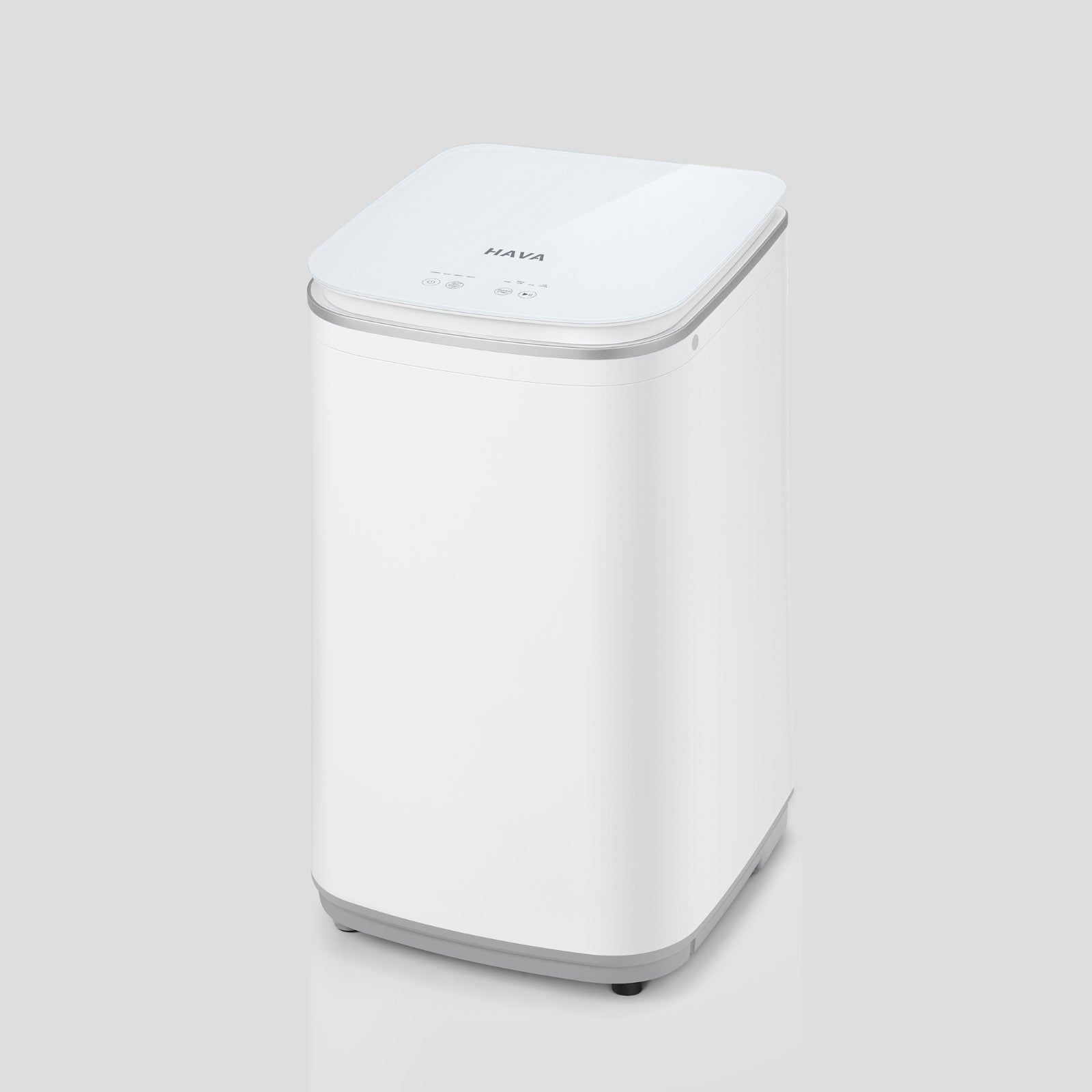 Go-clean's HAVA liten tvättmaskin med slät vit yta och minimalistisk design, visar den eleganta och funktionella formen som passar i alla moderna hemmiljöer.