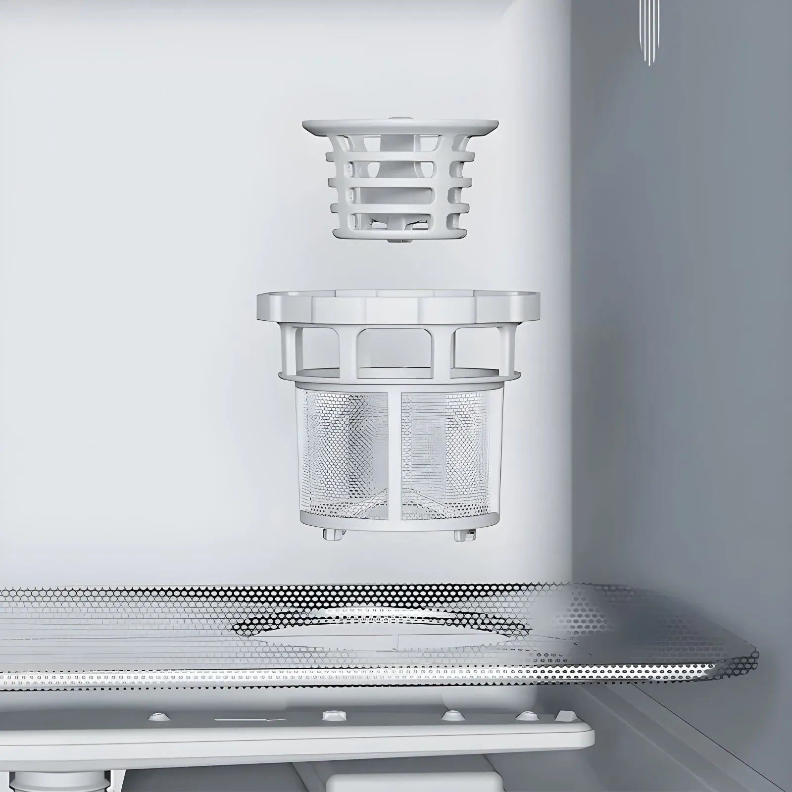 HAVA Bänkdiskmaskin från Go-clean.se med närbild på det löstagbara filtret och rostfria bottensilen för enkel rengöring och effektiv filtrering.